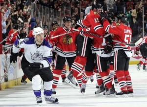 Dancing in the Reign: Hawks capitalize in OT; Kings fall 3-2